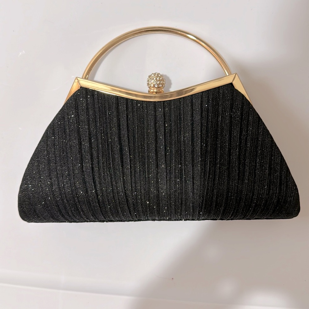 Black gold hand clutch